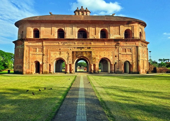 a stone building with a circular roof