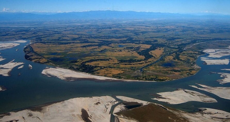 a river flowing through a valley